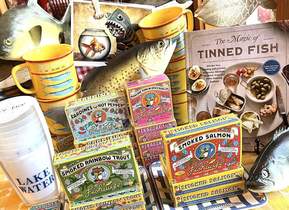 A playful display of specialty tinned fish and gifts